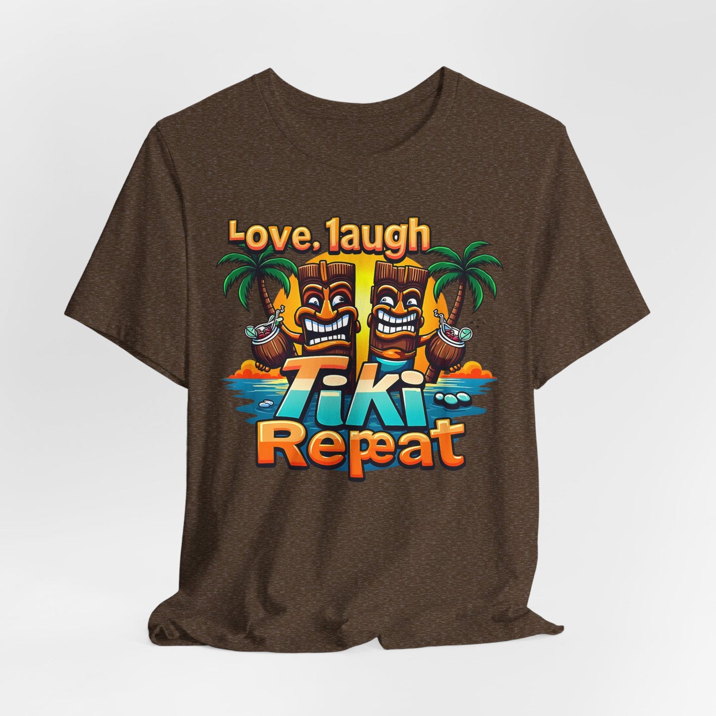 The Tiki Love Unisex Short Sleeve Tiki T-Shirt features two vibrant Tiki figures, palm trees, an ocean sunset, and “Love. Laugh. Tiki… Repeat” in bold colors for a fun tropical vibe.