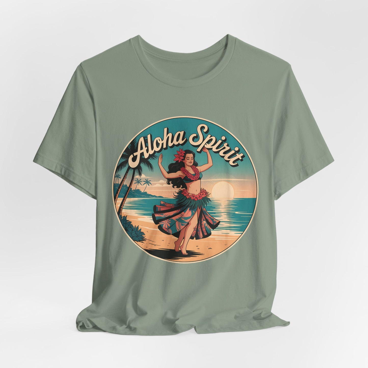 The Aloha Spirit Graphic T-Shirt features a green tee with a circular hula dancer design by the ocean at sunset, palm trees, and retro Aloha Spirit lettering—perfect for beach lovers and island dreamers.