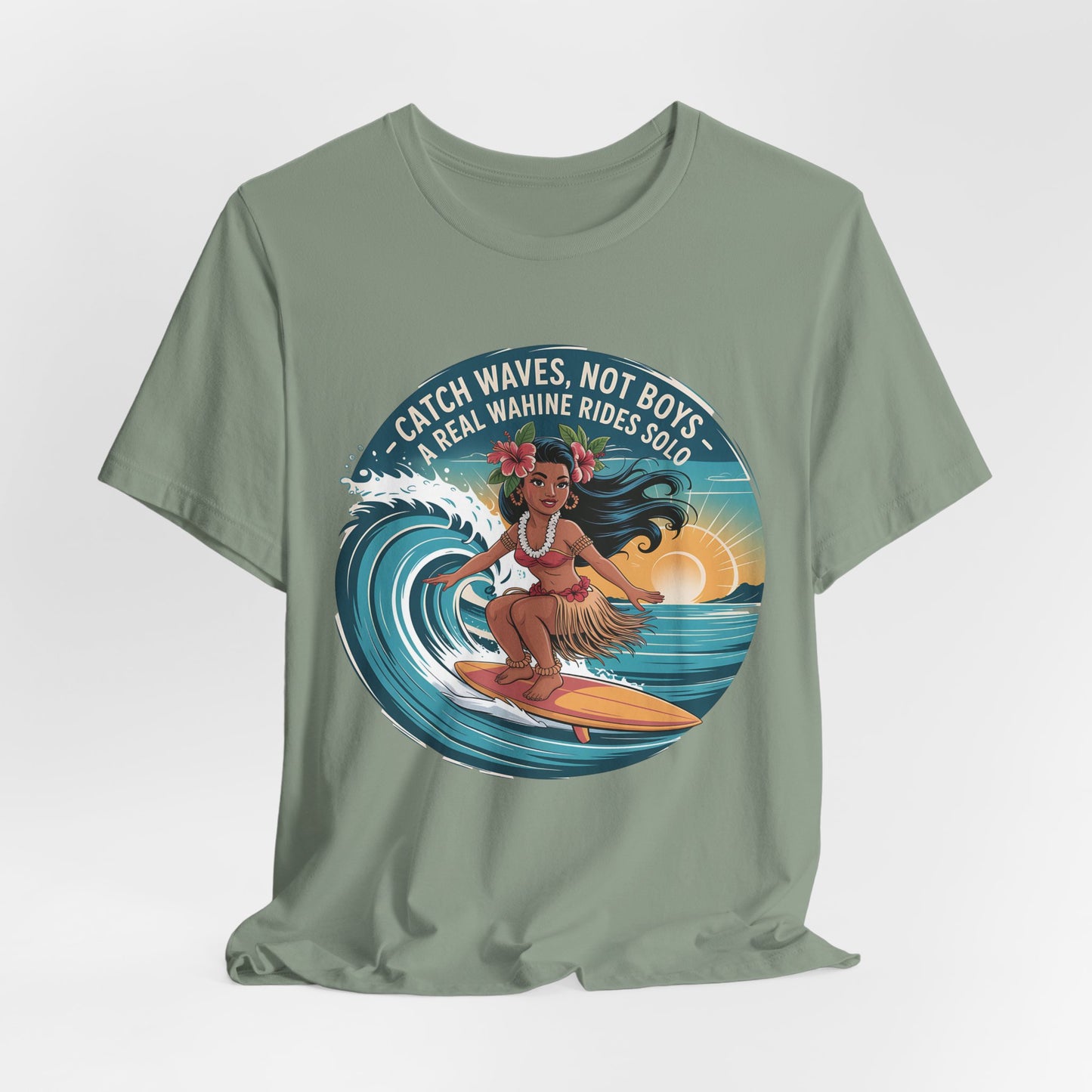 The Catch Waves Not Boys Wahine T-Shirt features a surfing woman in a hula skirt and flower crown at sunset with the motto “Catch Waves, Not Boys—A Real Wahine Rides Solo.” A bold graphic tee for spirited beach lovers.