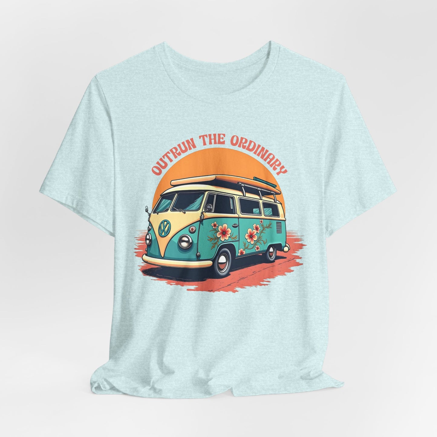 The Outrun the Ordinary Vintage VW Bus T-Shirt is a light blue unisex tee featuring a green and yellow van with orange flowers, set before an orange sunburst and topped with the text OUTRUN THE ORDINARY.