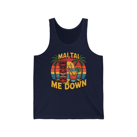 The Tropical Mai Tai Tank in navy blue features a retro design with a tiki mask, mai tai cocktail, palm trees, and sunset. MAI TAI ME DOWN pops in bold yellow—perfect for beach days or summer parties.