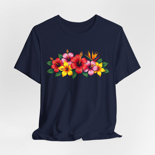 The Tropical Floral Unisex T-Shirt is a navy blue summer shirt with bold red, pink, and yellow hibiscus flowers plus green leaves across the chest—ideal for boho fashion lovers seeking a bright, vibrant style.