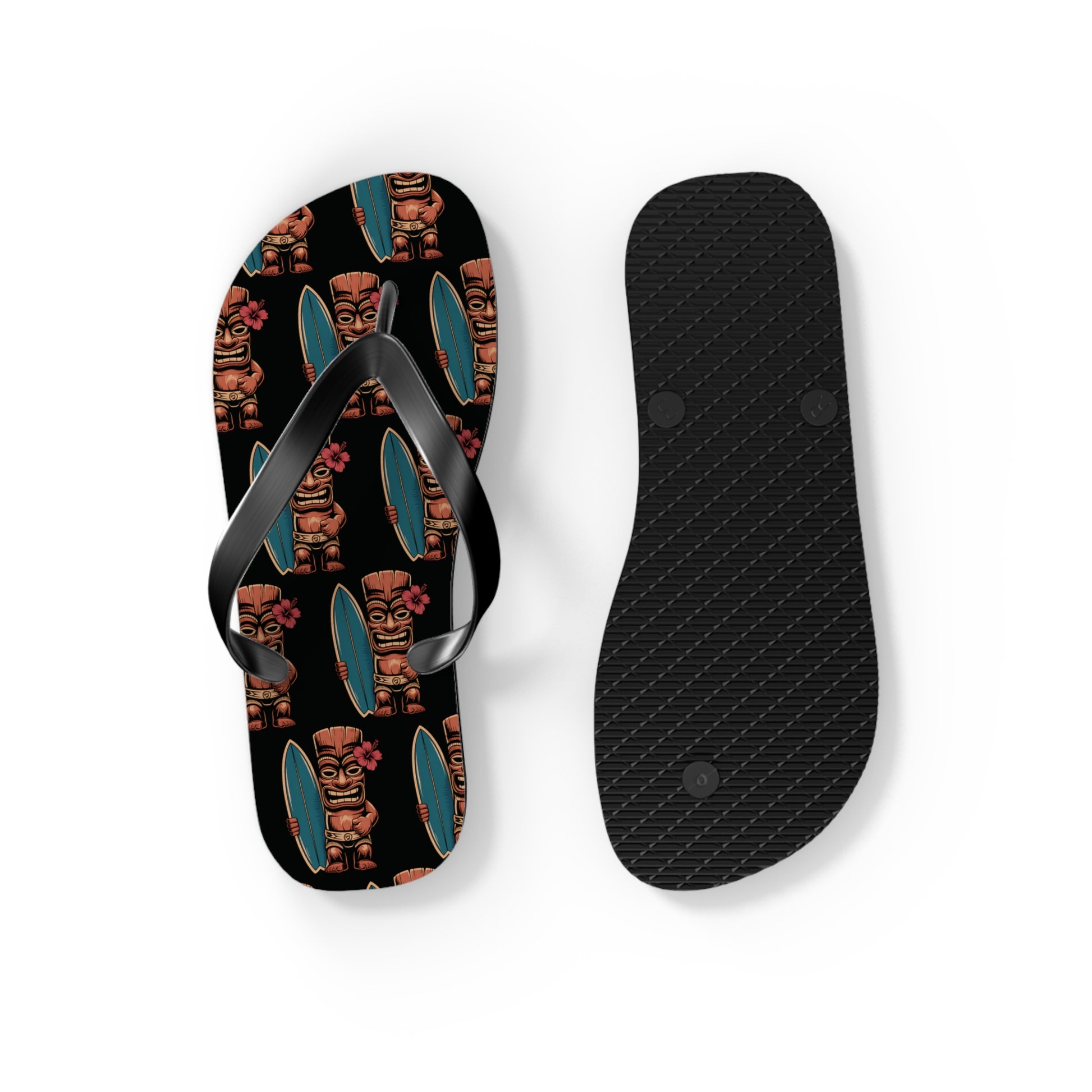 The Tiki Surf Flip Flops - Fun Summer Beach Sandals are black flip-flops, one displaying the sole and the other the top with colorful tiki statues holding surfboards on a black background.