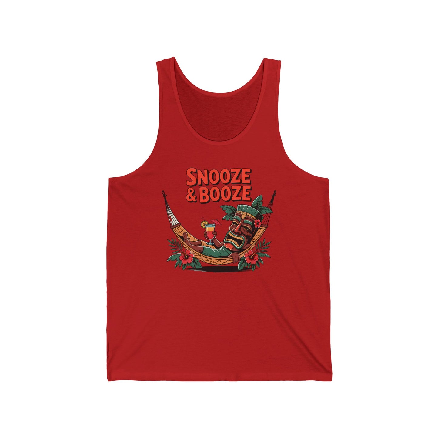 The Snooze & Booze Unisex Jersey Tiki Tank Top features a relaxed person lounging in a hammock between two tiki statues, surrounded by tropical plants, with SNOOZE & BOOZE in bold orange letters above—perfect for beach days and parties.