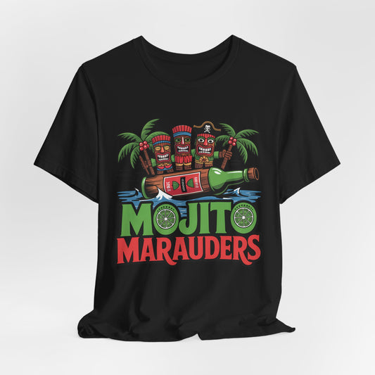 The Mojito Marauders Tiki T-Shirt features three tiki figures in a pirate hat, palm trees, bottles, limes, and bold green/red text on a soft unisex jersey—perfect for tropical vibes.