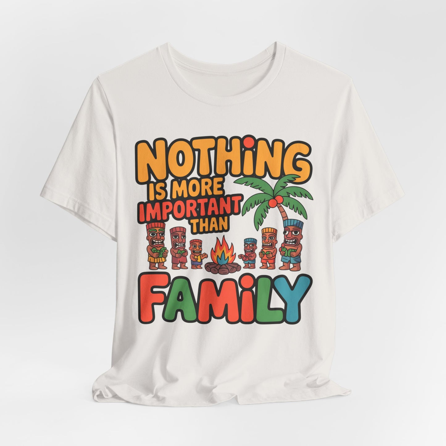 The Family Tiki Tee - Nothing is More Important Than Family Unisex T-Shirt features colorful text, cartoon tiki figures, a campfire, and a palm tree—a great choice for making a family statement or wearing to your next reunion.