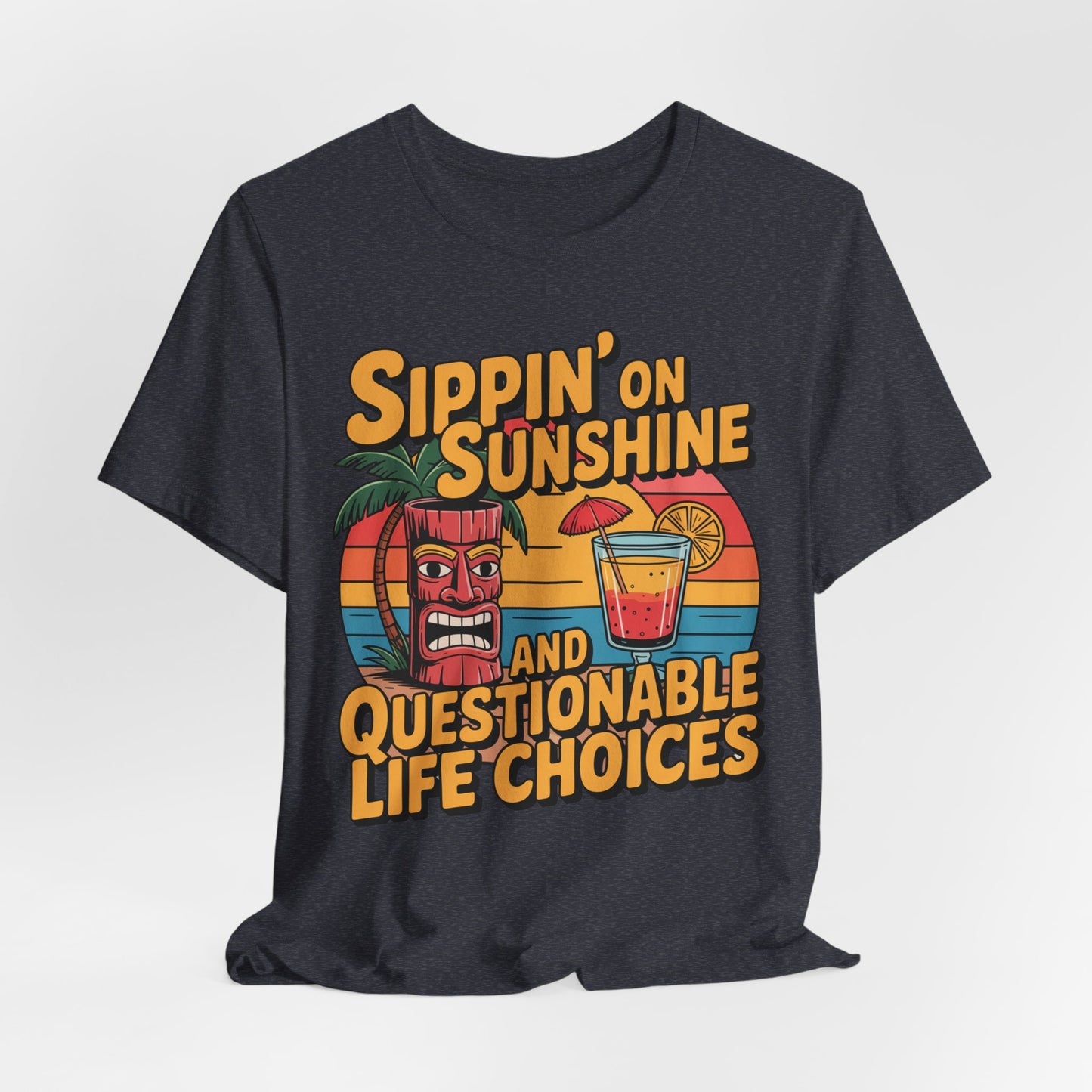 The Sippin on Sunshine Tiki T-Shirt is a black unisex jersey featuring a colorful retro tiki face, palm tree, and cocktail with fun text—ideal for beach lovers seeking breathable summer style.