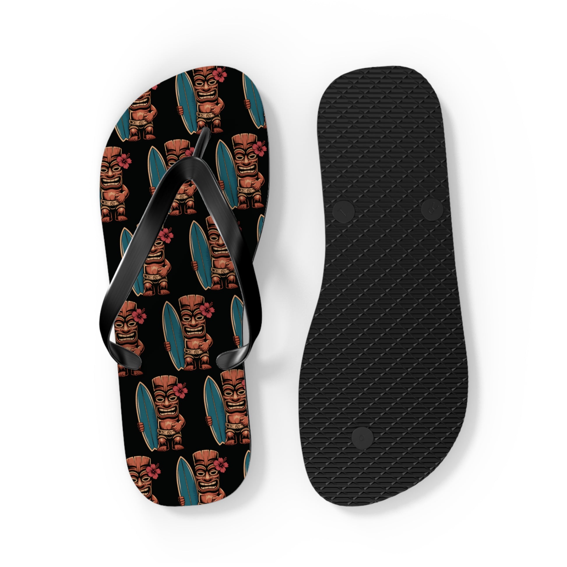 Tiki Surf Flip Flops - Fun Summer Beach Sandals feature vibrant tiki statues with surfboards on a black background; the plain black sole offers a textured grip.