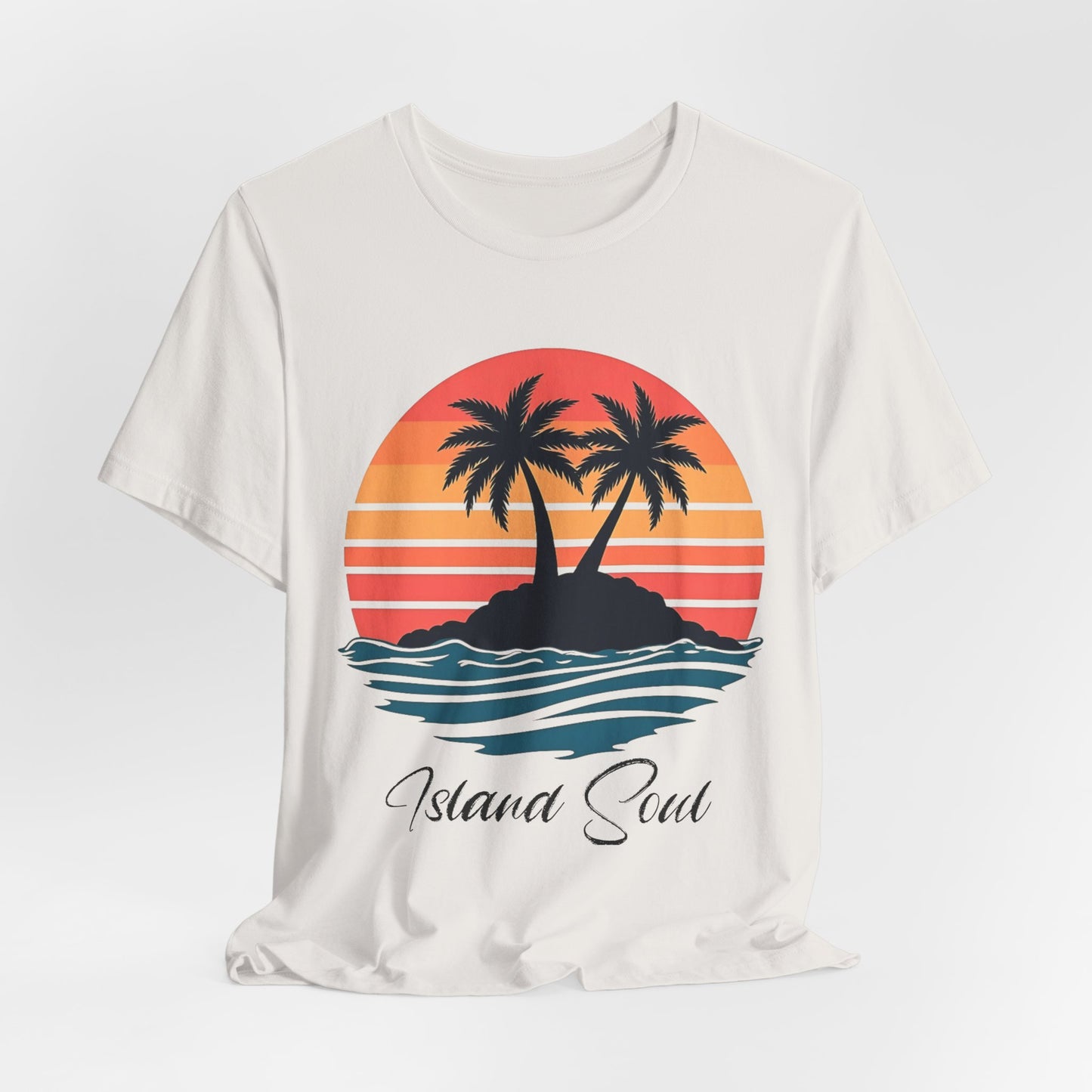 The Island Soul Unisex T-Shirt features a retro sunset design with two palm trees on an island, ocean waves, and “Island Soul” text—perfect beachwear for relaxed island vibes.