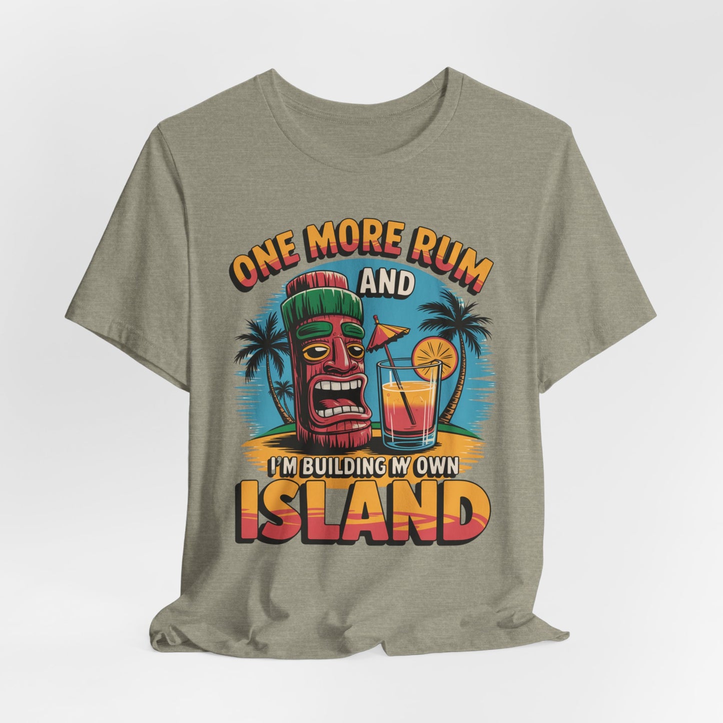 The Tropical Vacation Tiki T-Shirt - One More Rum and Im Building My Own Island is a gray unisex jersey tee with lightweight fabric, featuring a colorful tiki face, palm trees, and a tropical drink—perfect for beach lovers.