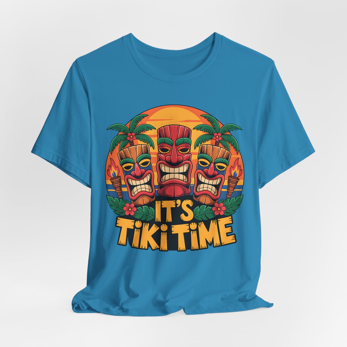 Blue t-shirt with Tiki mask design and 'It's Tiki Time' text on a white background
