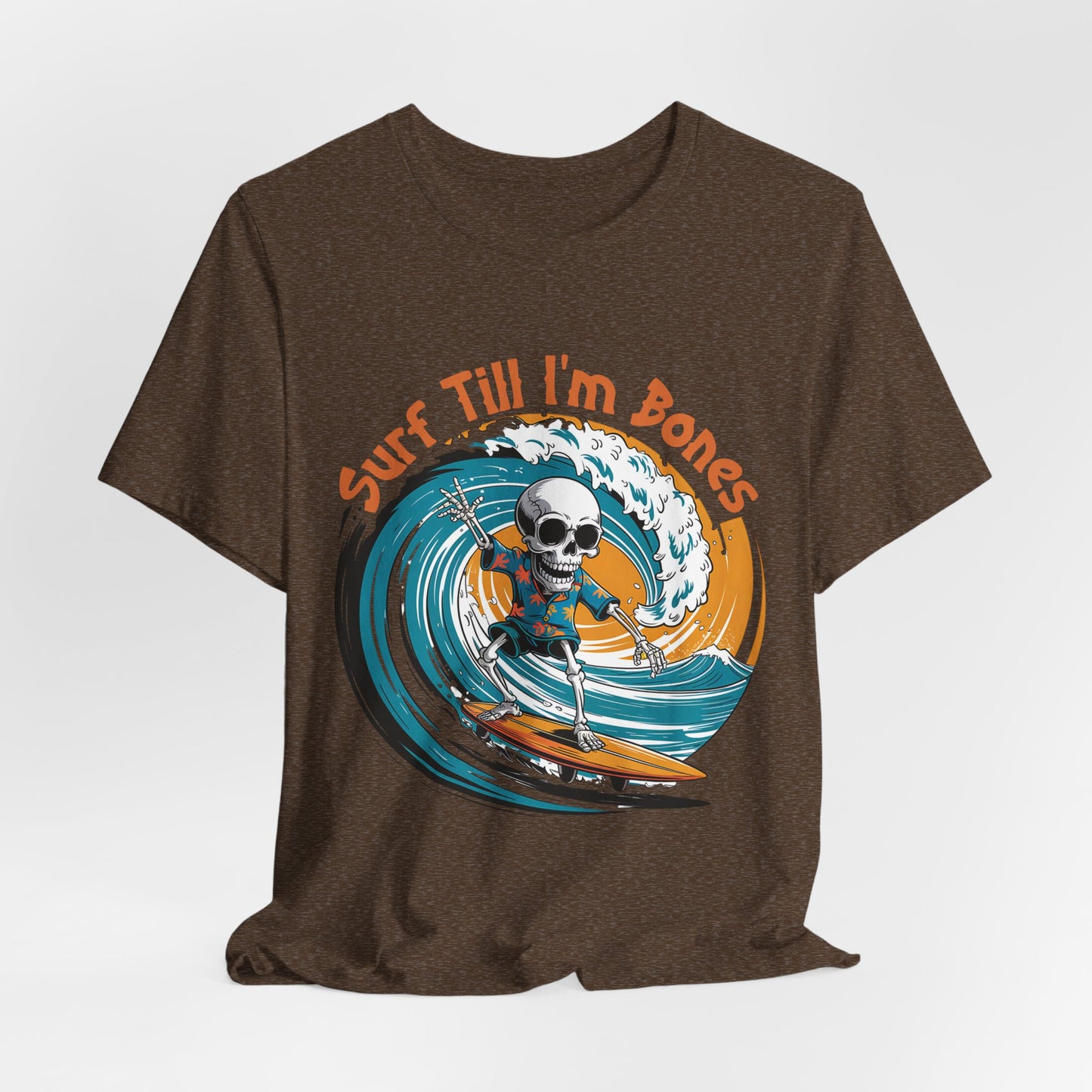 The Surf Till Im Bones Unisex Jersey Tee is a brown shirt featuring a skeleton surfing a big blue wave with bold orange Surf Till Im Bones lettering—perfect for beach lovers.
