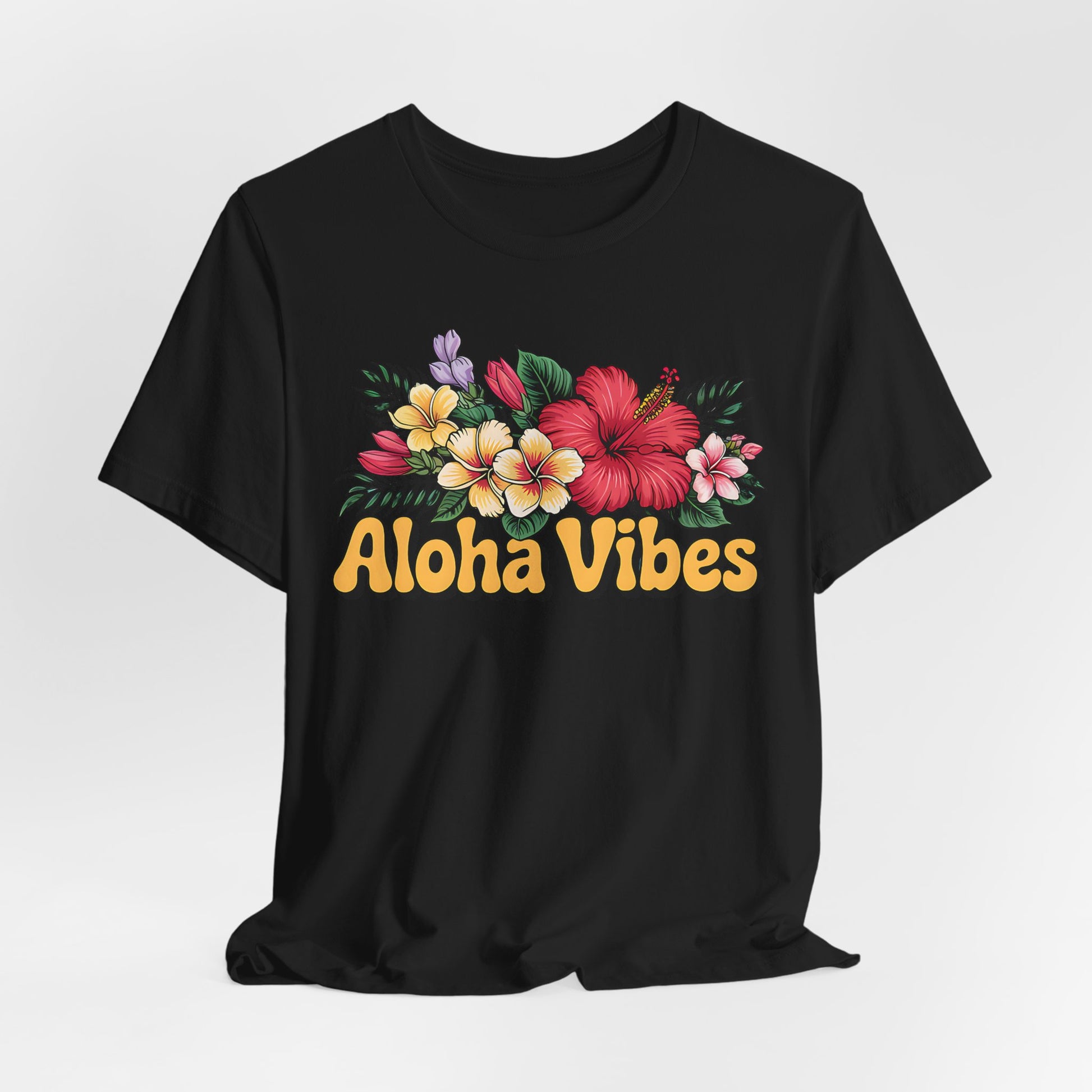 The Aloha Vibes Floral Unisex T-Shirt for Island Vibes is a black jersey tee with colorful tropical flowers and bold yellow Aloha Vibes text in a playful font, crafted from breathable fabric and shown against a plain white background.