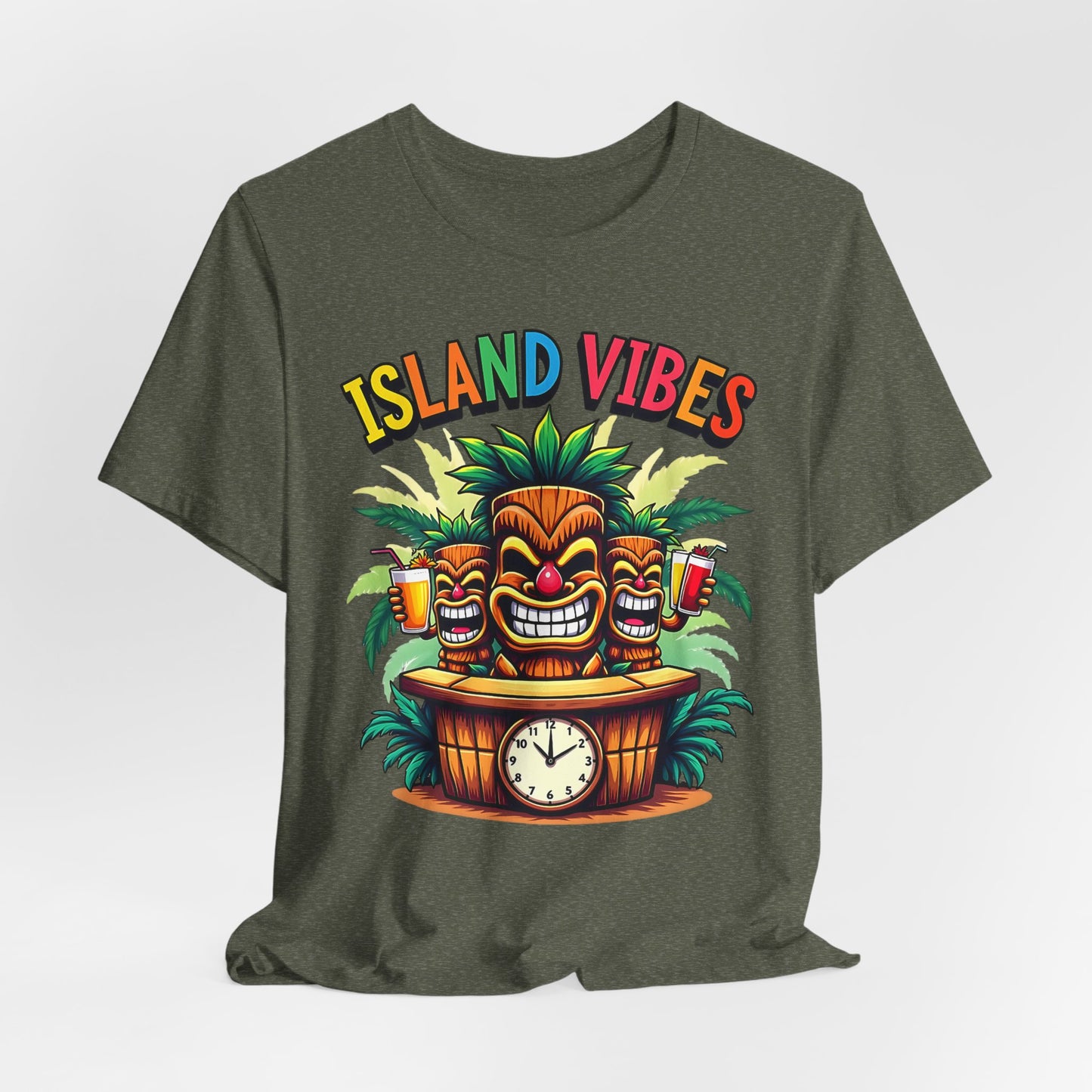 The Island Vibes Tiki T-Shirt – Unisex Relaxed Fit – features colorful tiki faces, drinks, palm leaves, a rainbow ISLAND VIBES, and a 5:00 clock. Perfect for tropical lovers and anyone embracing the island lifestyle!.