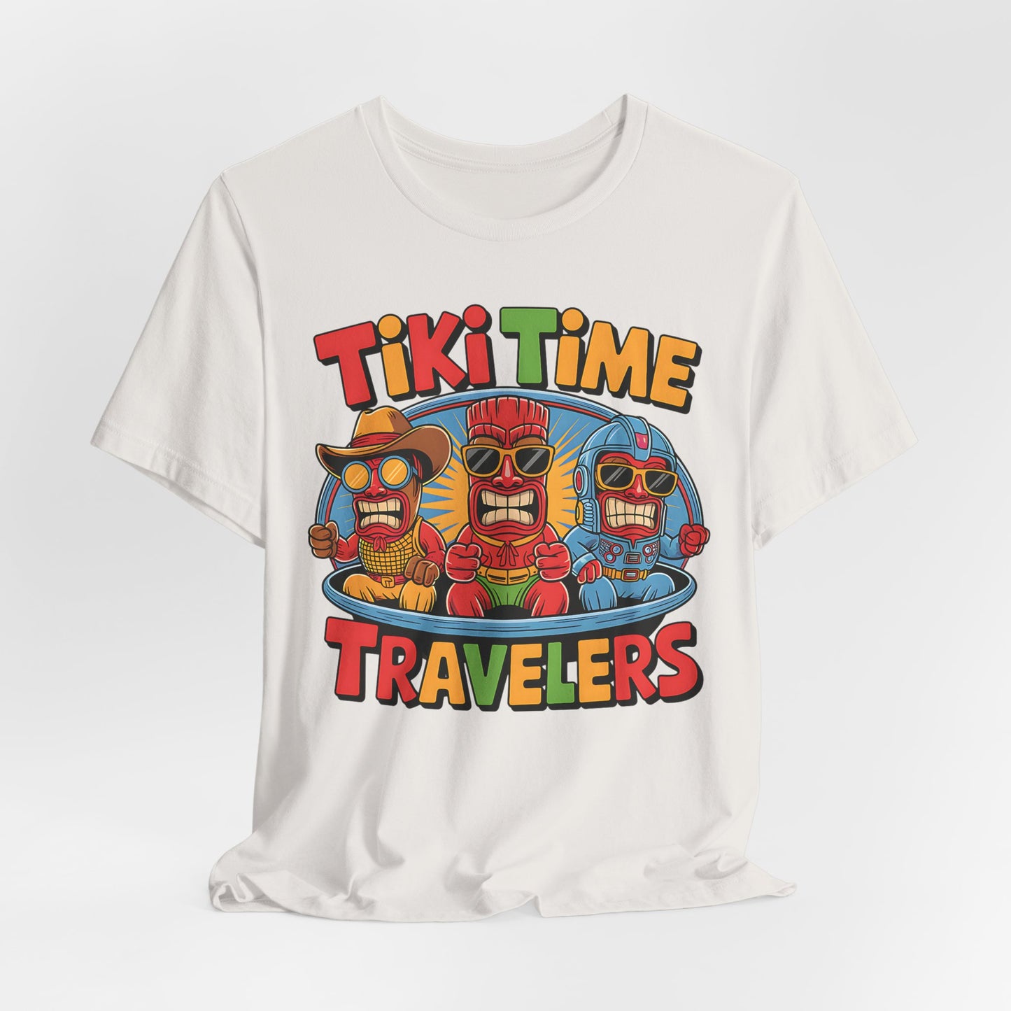 The Tiki Time Travelers Unisex Tiki T-Shirt features three cartoon Tiki figures in sunglasses and hats inside a blue ring, with vibrant lettering—perfect for summer beach parties or your next travel adventure!.